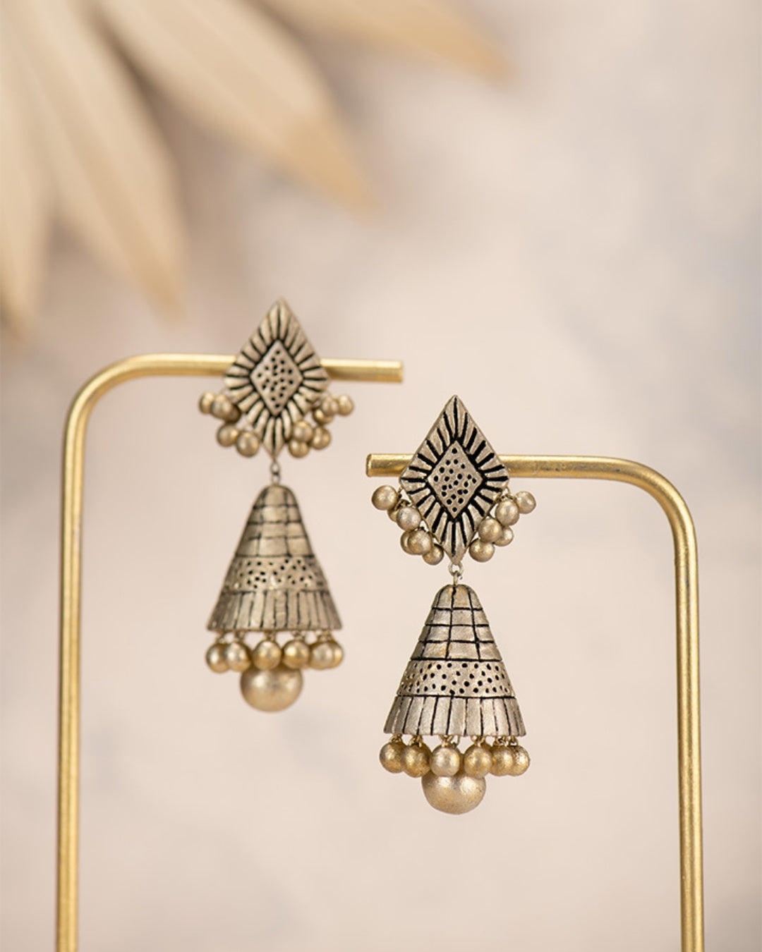 Terracotta-Mettalic-And-Silver-Jhumka-Earrings