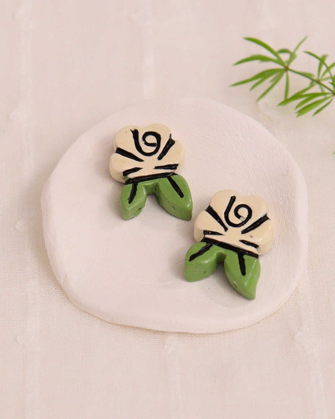 white-stud-earrings