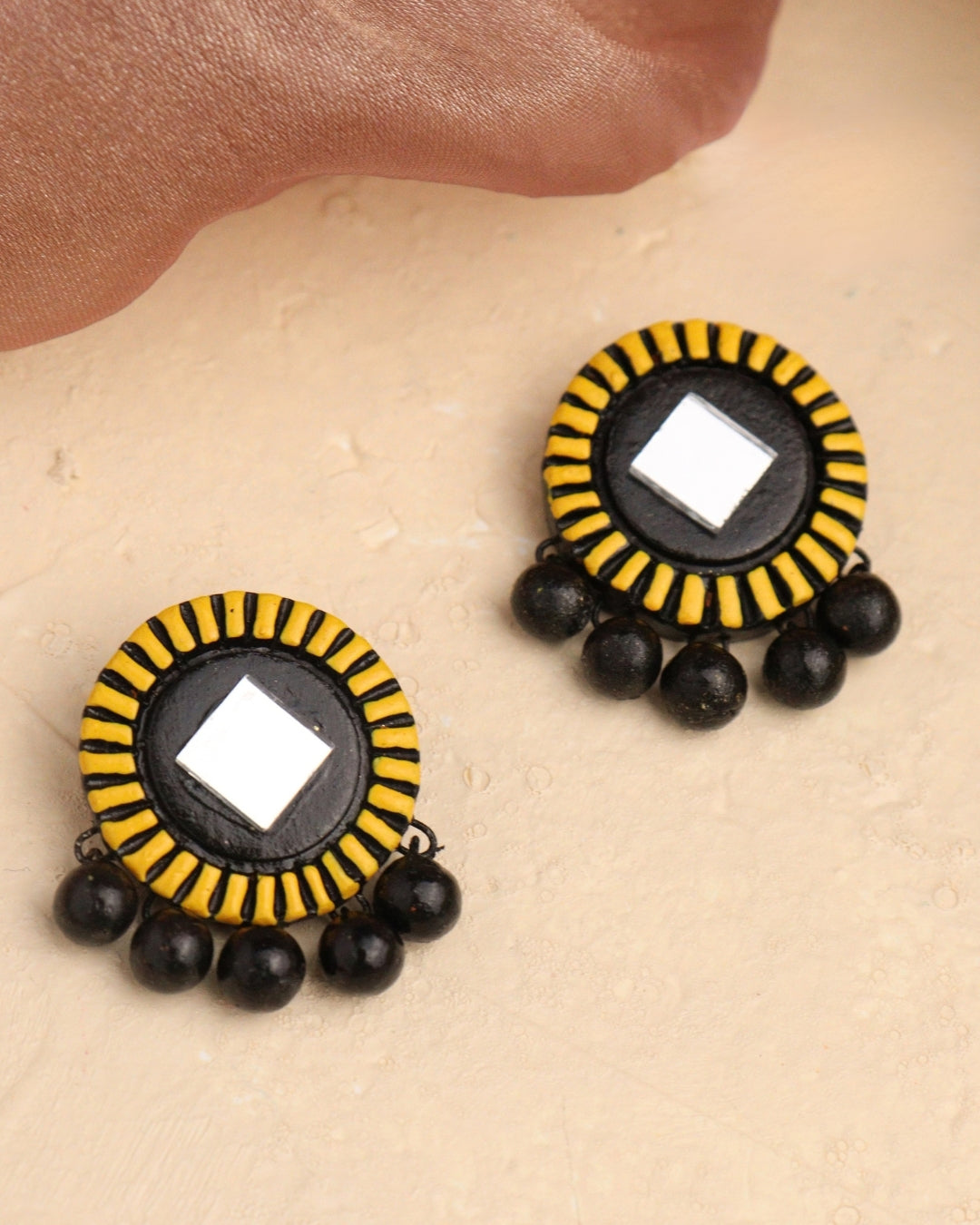 mirror-studs