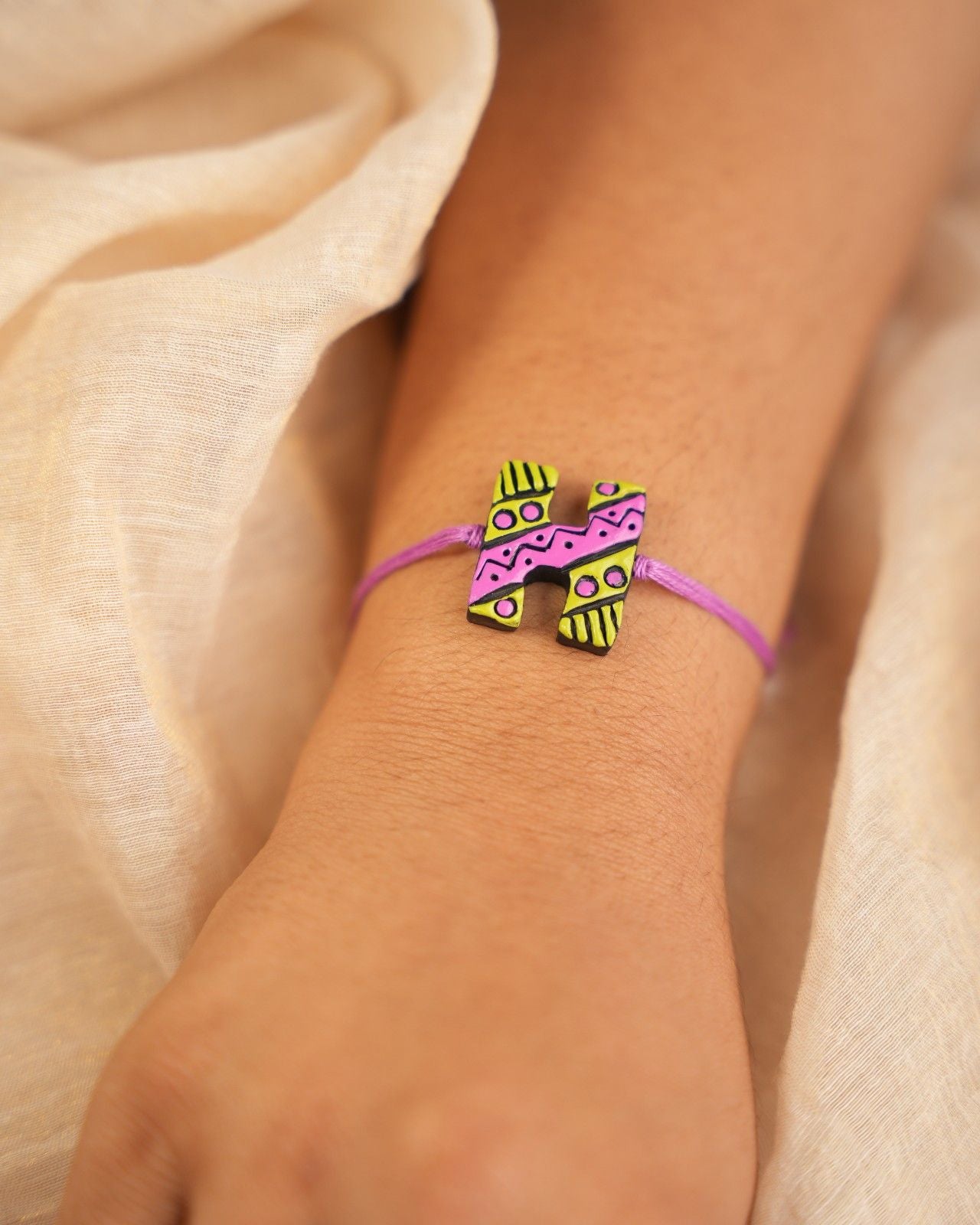 Crayon Initial Rakhi