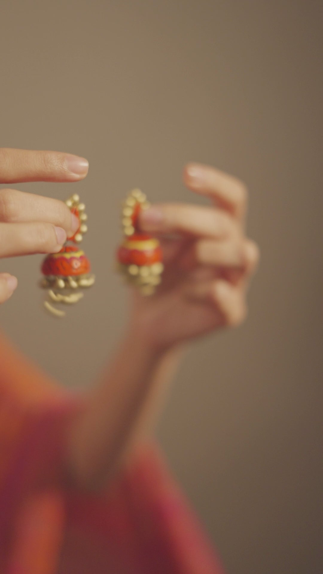 Orange-jhumkas-gold